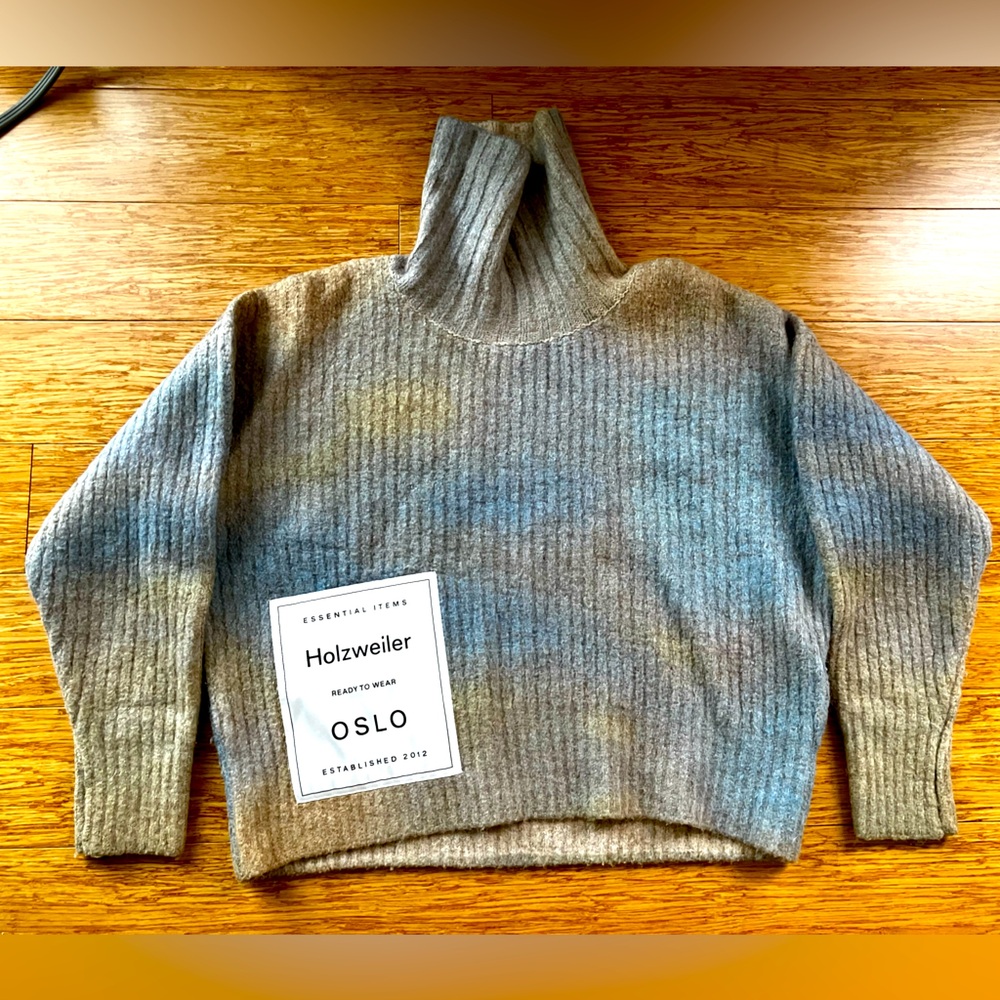 Blue and yellow Holzweiler turtle neck knit sweater with large label patch